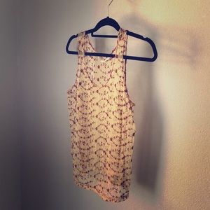 Sheer floral print layering tank top.